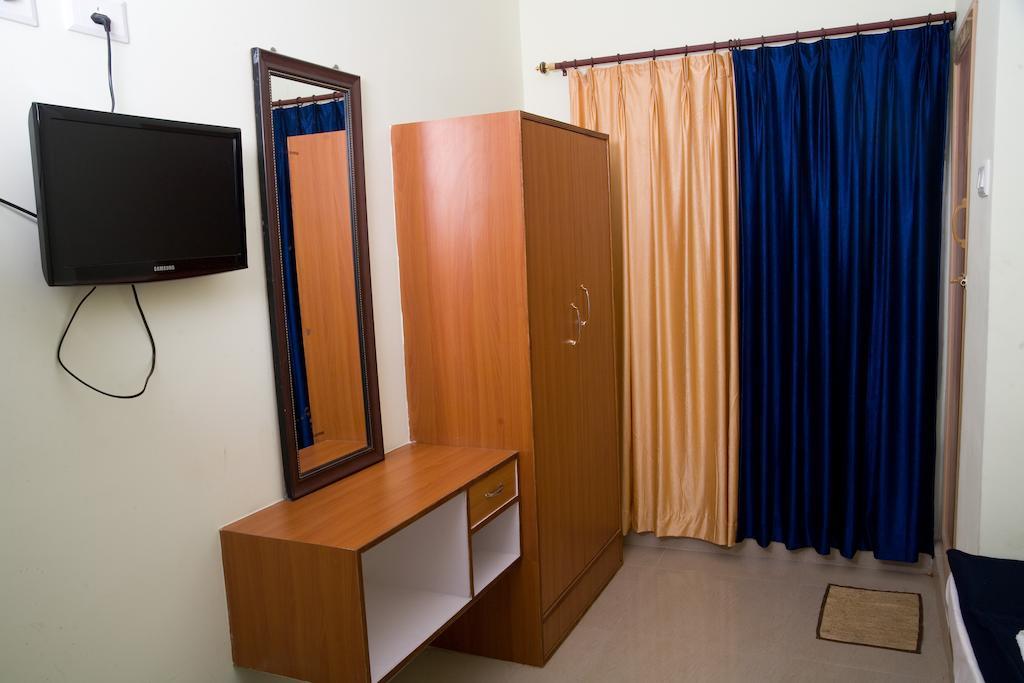 Vihas Inn Тирупати Номер фото