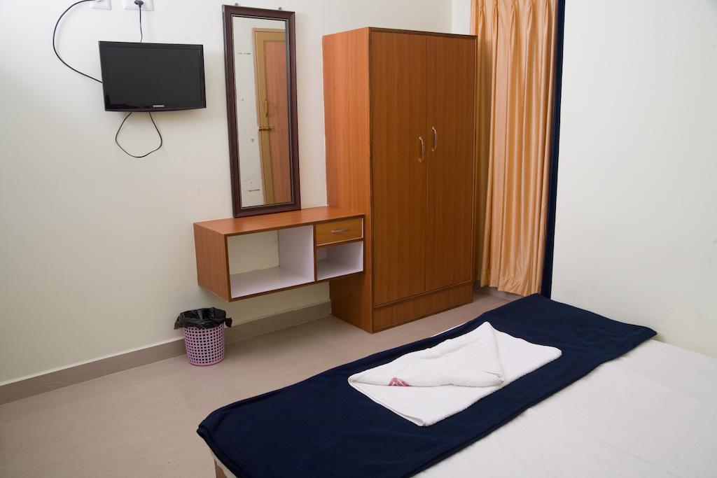Vihas Inn Тирупати Номер фото