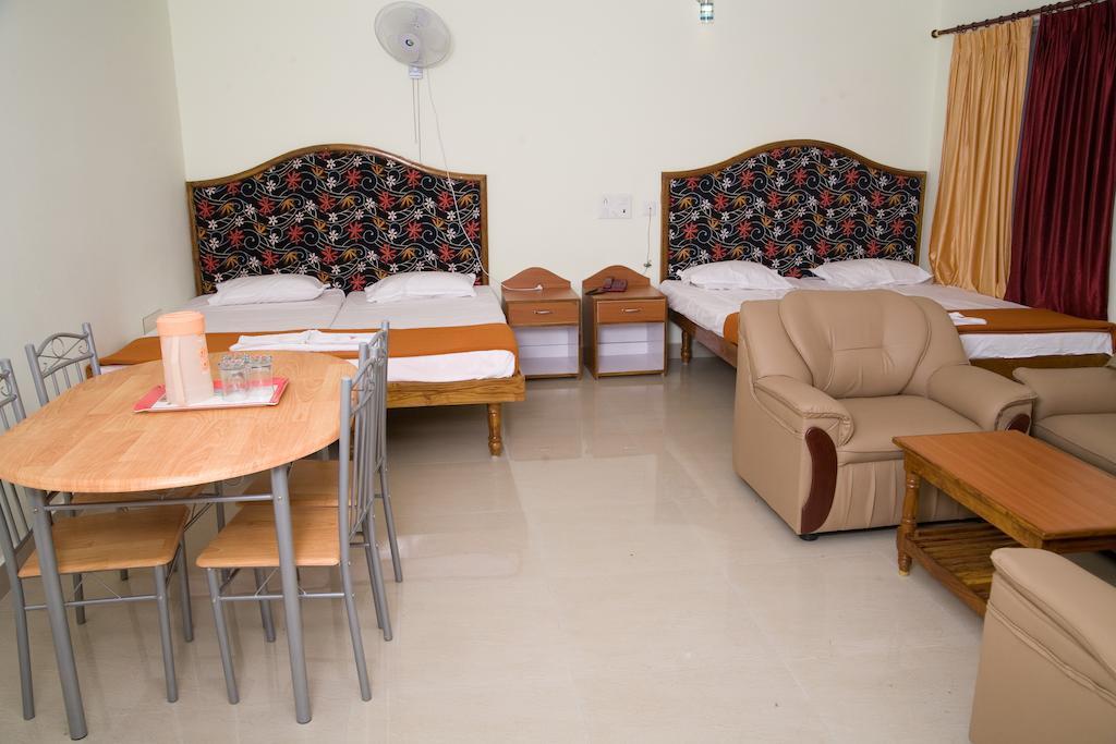 Vihas Inn Тирупати Номер фото