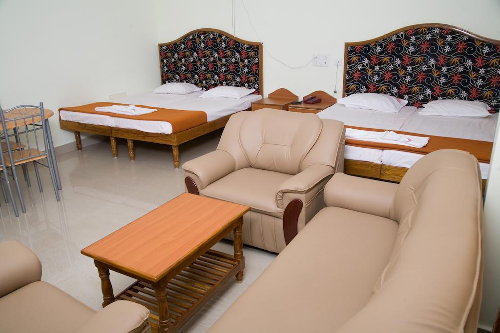 Vihas Inn Тирупати Номер фото